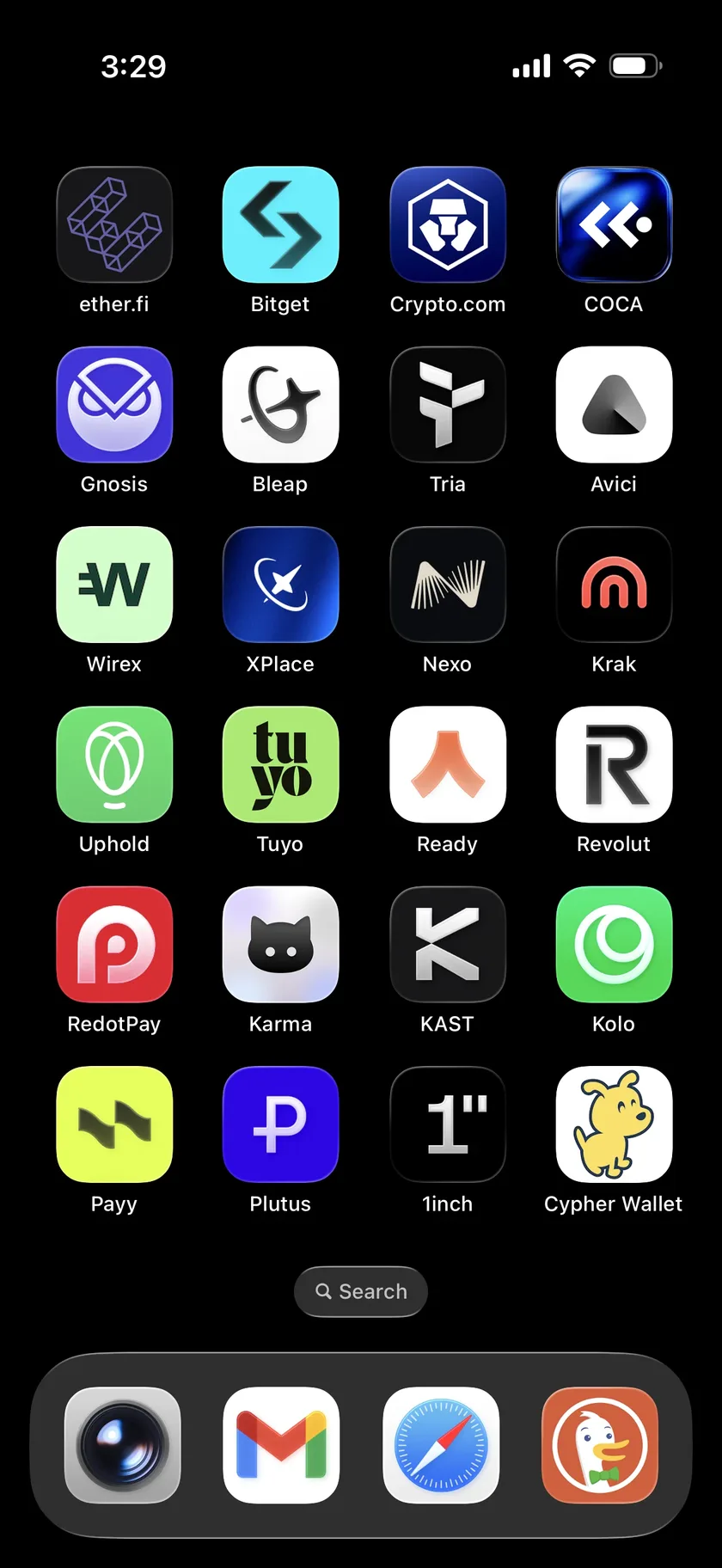 iPhone home screen showing 24 crypto card apps installed and actively used for testing - including ether.fi, Bitget, Crypto.com, COCA, Gnosis Pay, Bleap, Tria, Avici, Wirex, xPlace, Nexo, Kraken, Uphold, Ready, RedotPay, KAST, Kolo, Payy, Plutus, 1inch, and Cypher Wallet