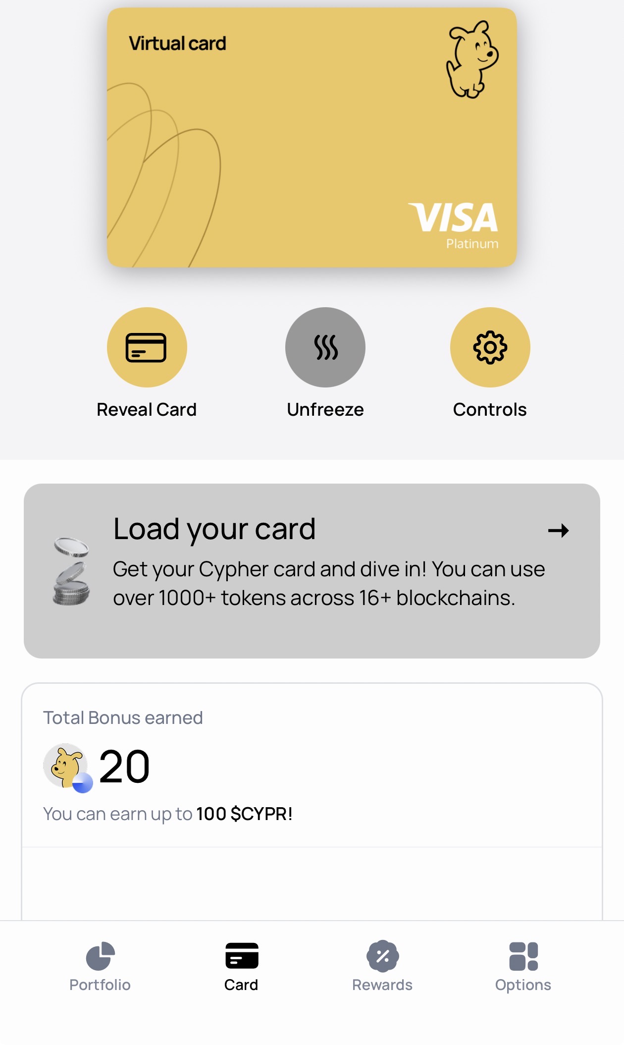 Cypher app virtual card dashboard showing Visa Platinum card with Reveal Card, Unfreeze, and Controls buttons, Load your card prompt mentioning 500+ tokens across 15+ blockchains, and Total Bonus earned of 20 CYPR tokens